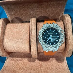 Casio G-Shock with Orange Band and Silver Detailing